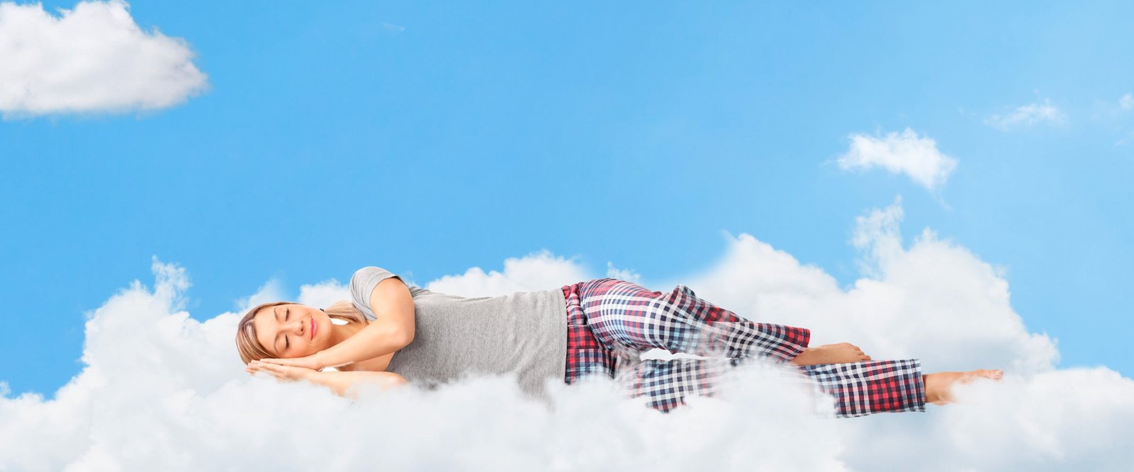 A person resting comfortably on a breathable mattress topper